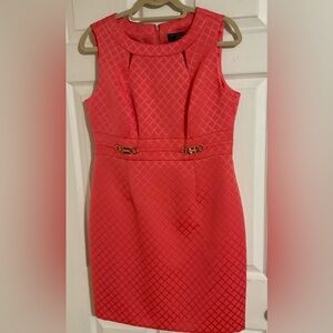 Tahari-Levine Studio, 10P, coral sleeveless dress with gold accents.